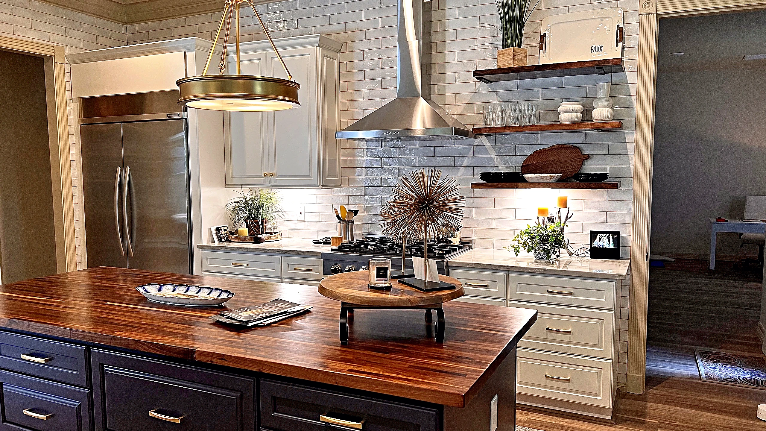 Completed full-home remodel in Tomball Texas by Bager Remodeling showing kitchen and living room